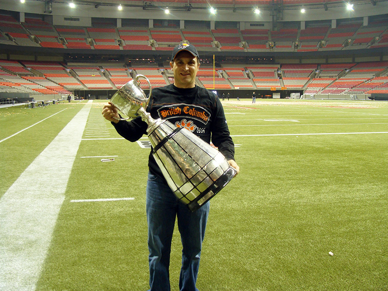 Ian Dunsmiur with Grey Cup